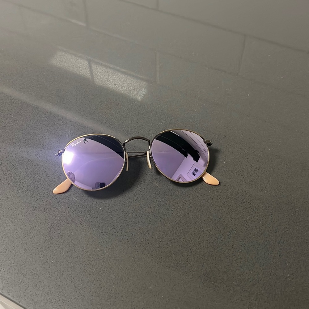 Classic Round Metal RayBan sunglasses with purple reflective lenses